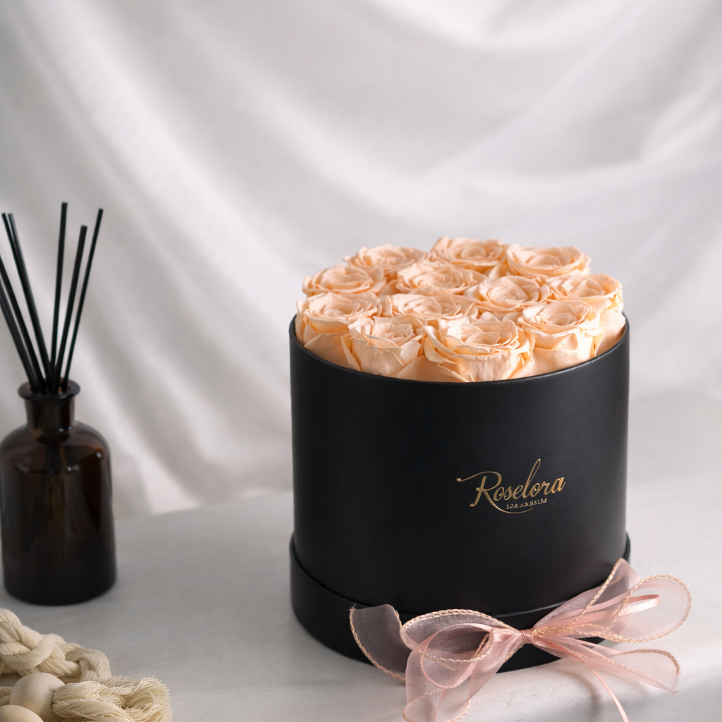 roselora blush color preserved rose in round box display on table