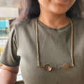 Bar necklace with dome and disc