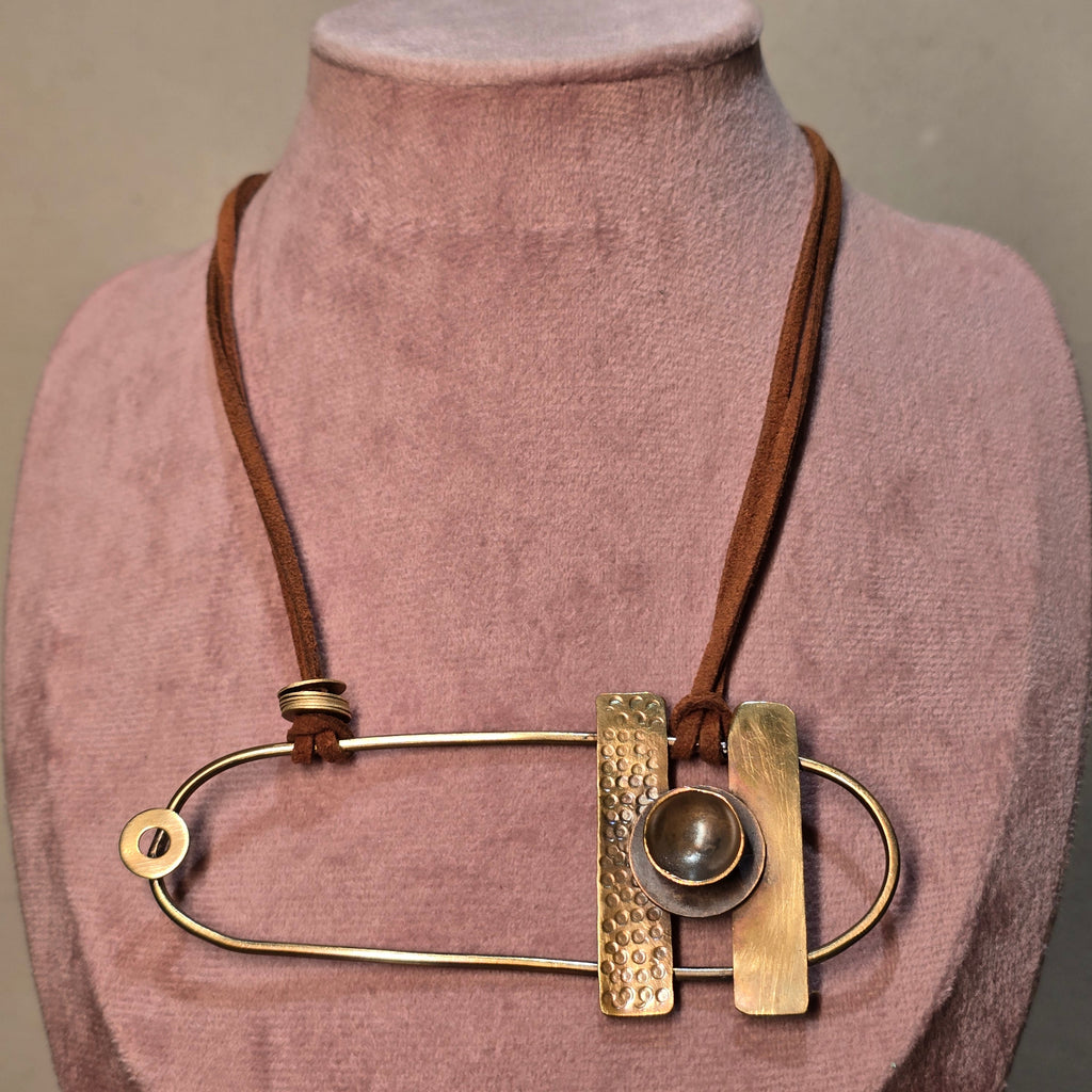 The Wanderer's Brass Pendant