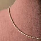 Dainty long pearl necklace