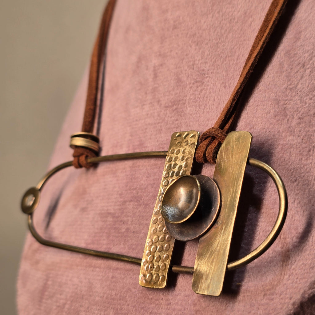 The Wanderer's Brass Pendant